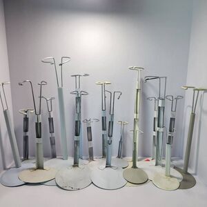 18 various doll display stands